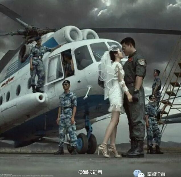 超炫軍人婚紗大片：戰(zhàn)機(jī)做背景 新娘美艷